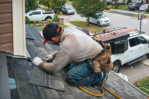 Professional Roofing technician working in Hallam, PA